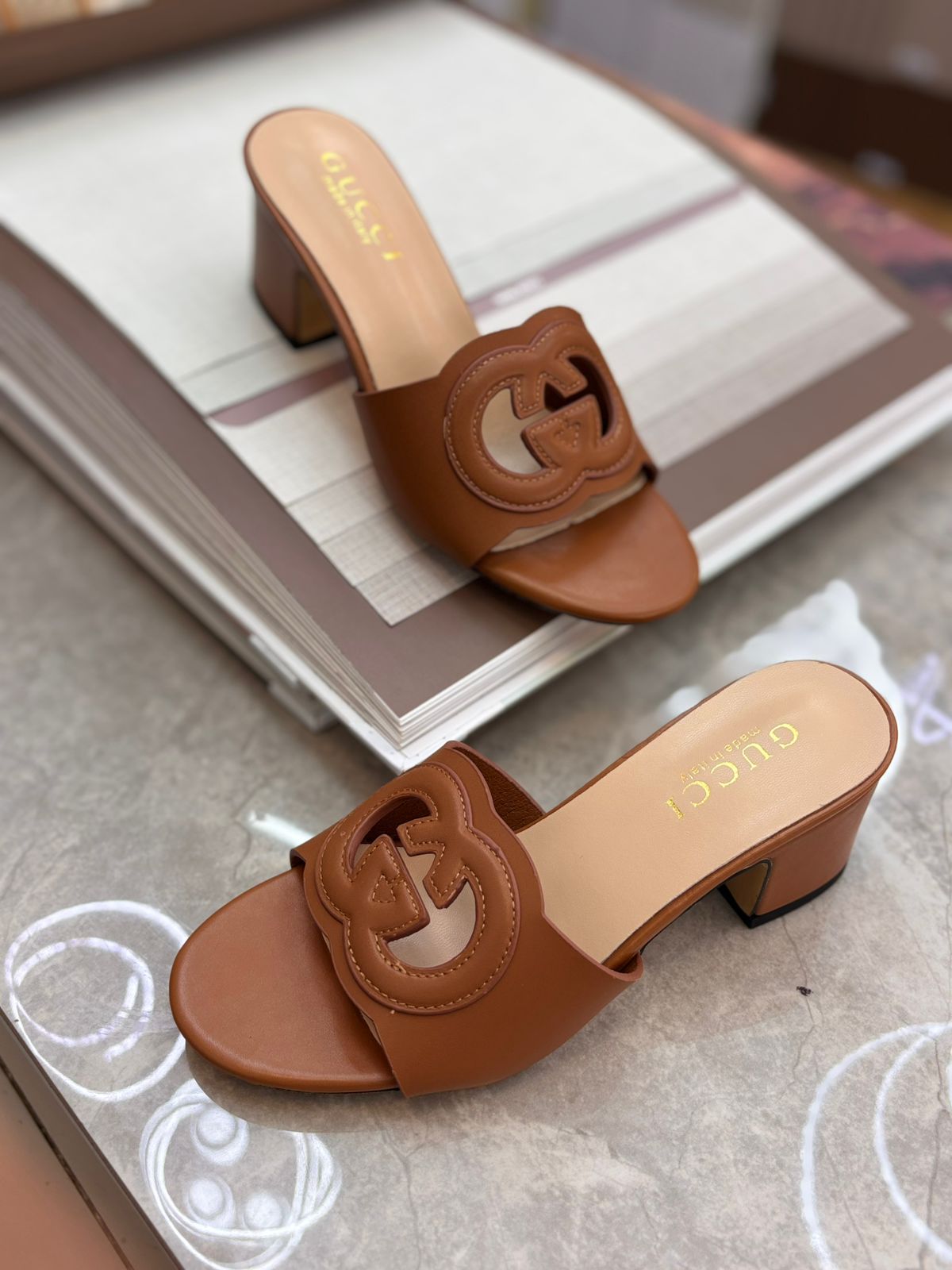 Gucci Interlocking G leather Mules "Brown"