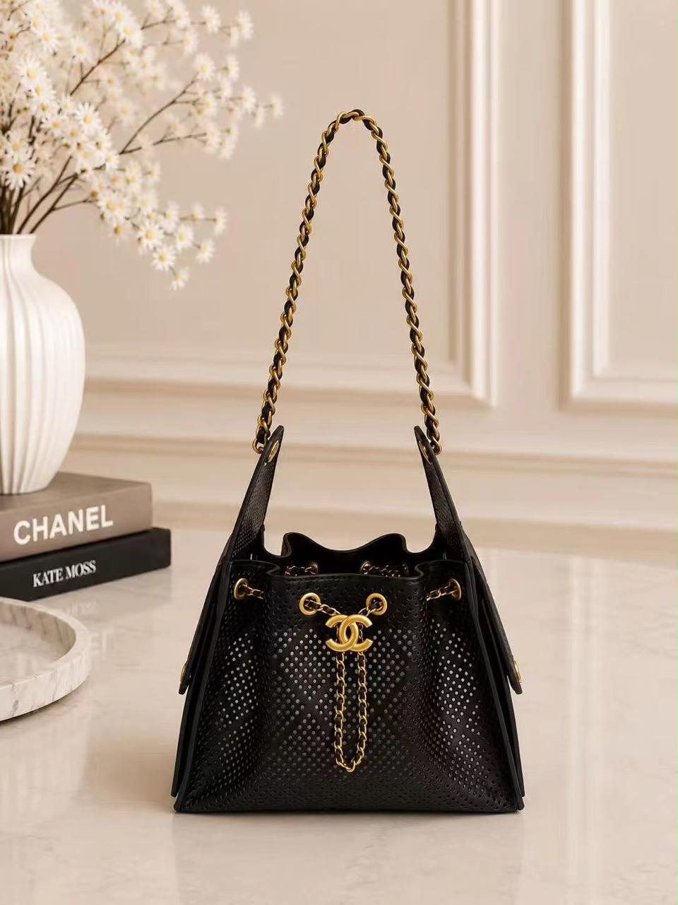 Chanel Perforated Drawstring Bucket Bag – Black