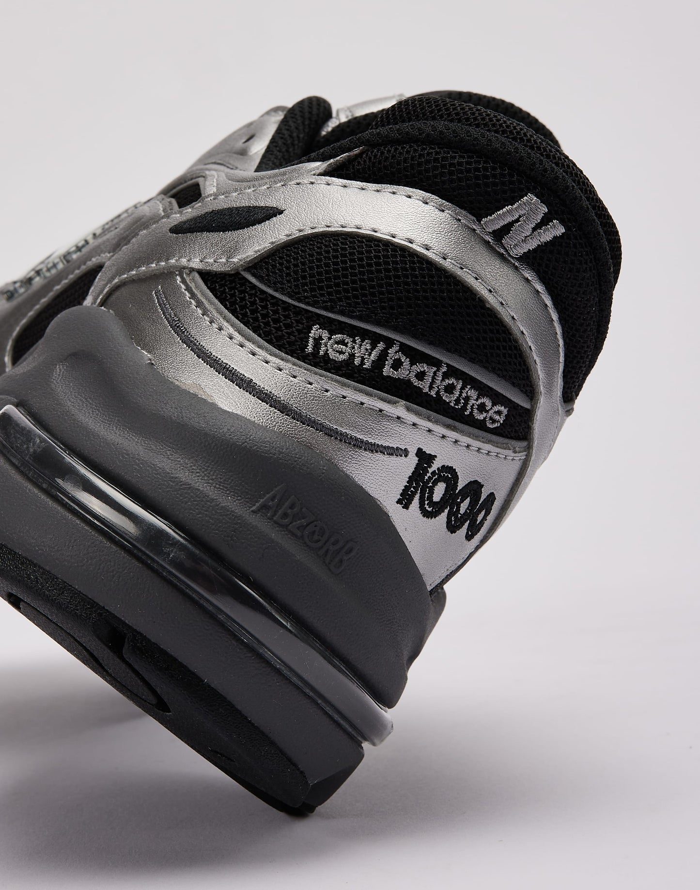 New Balance 1000 " black and metallic silver "