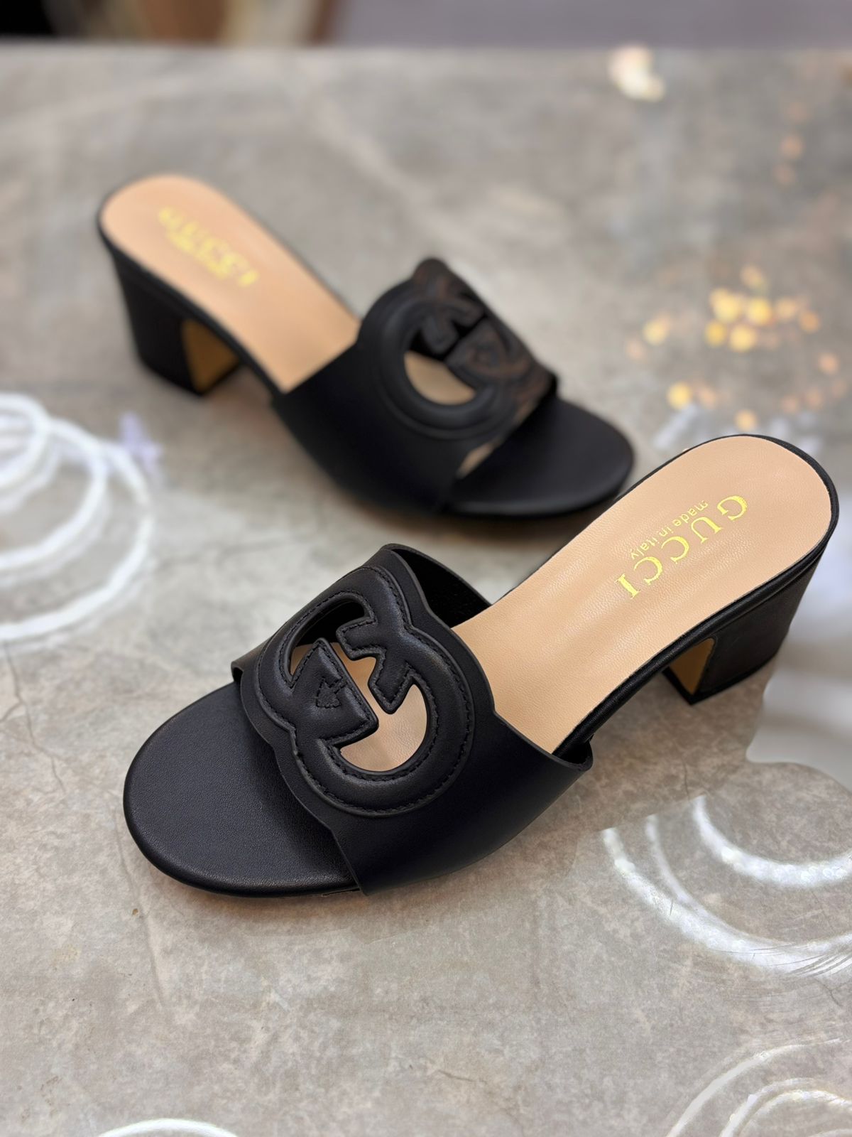 Gucci Interlocking G leather Mules "Black"