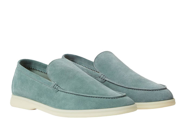 Loro Piana Summer Walk suede loafers in sage green with white rubber sole displayed