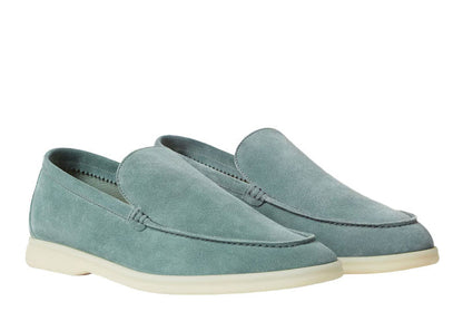 Loro Piana Summer Walk suede loafers in sage green with white rubber sole displayed