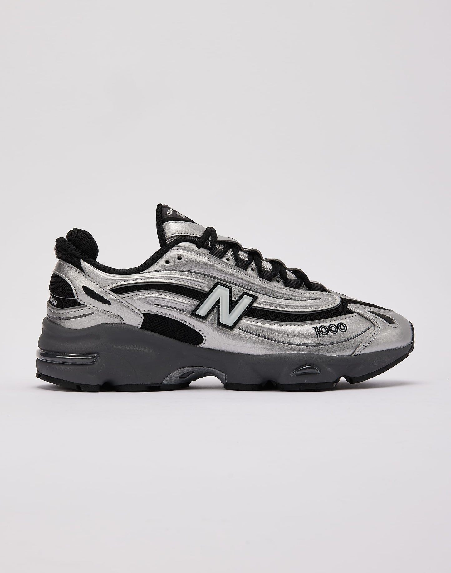 New Balance 1000 " black and metallic silver "