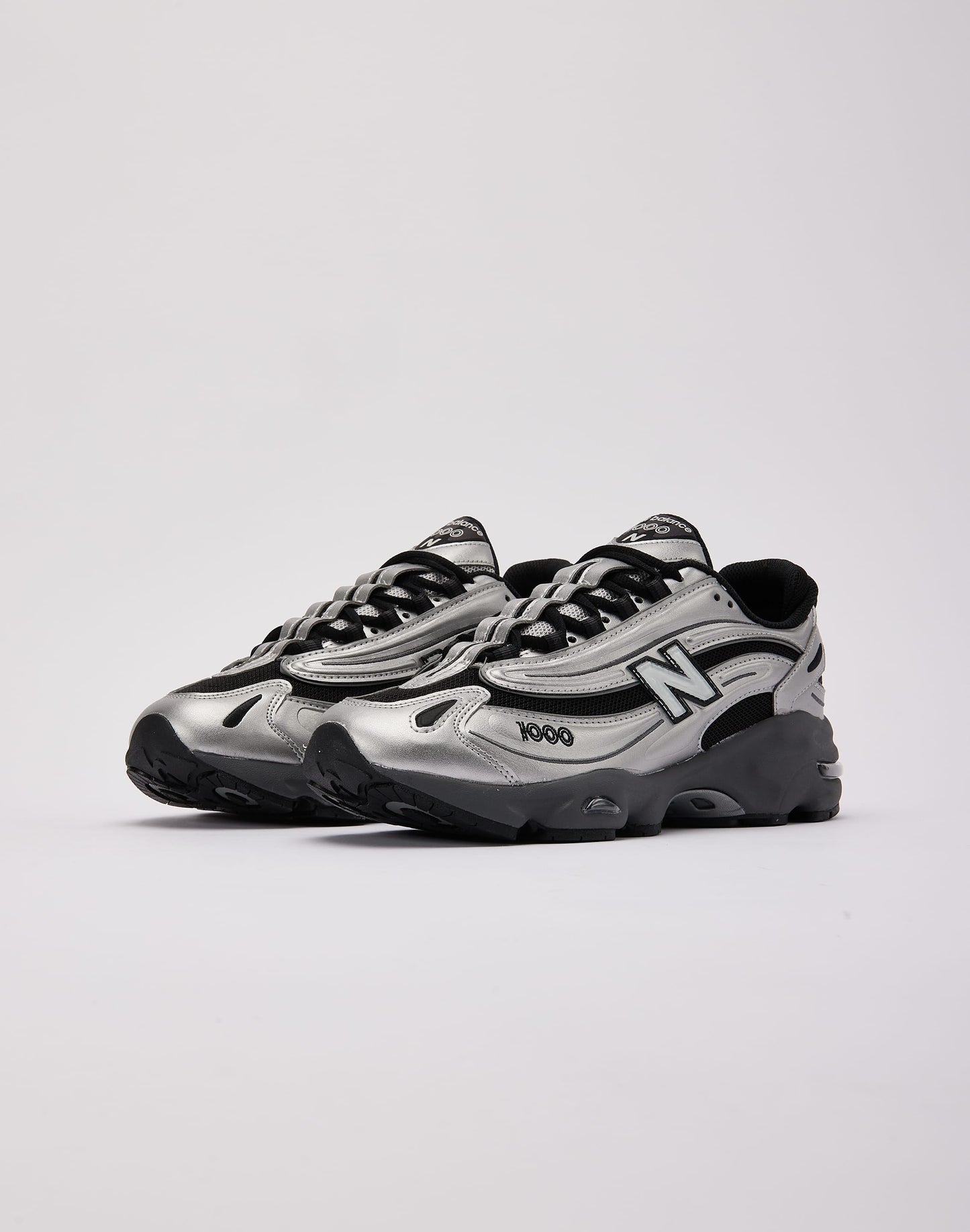 New Balance 1000 " black and metallic silver "