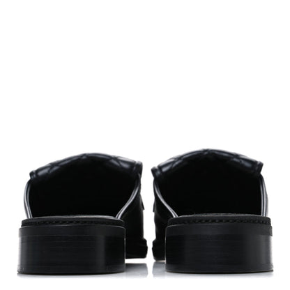 Channel Black Quilted Leather Flat Mule Slides