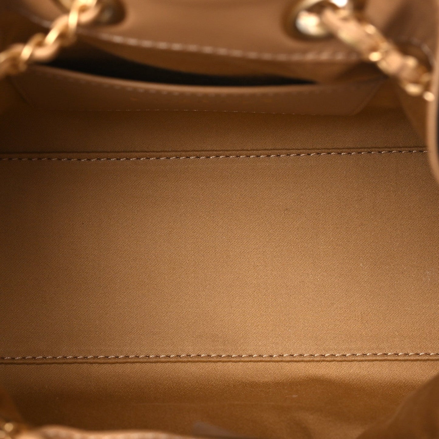 Channel Tan Woven Quilted Bucket Bag.