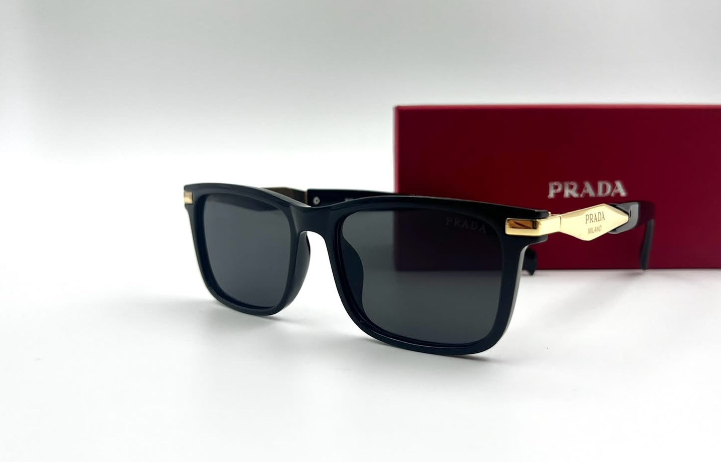 Prada Black Square Sunglasses with Gold Temple Accents