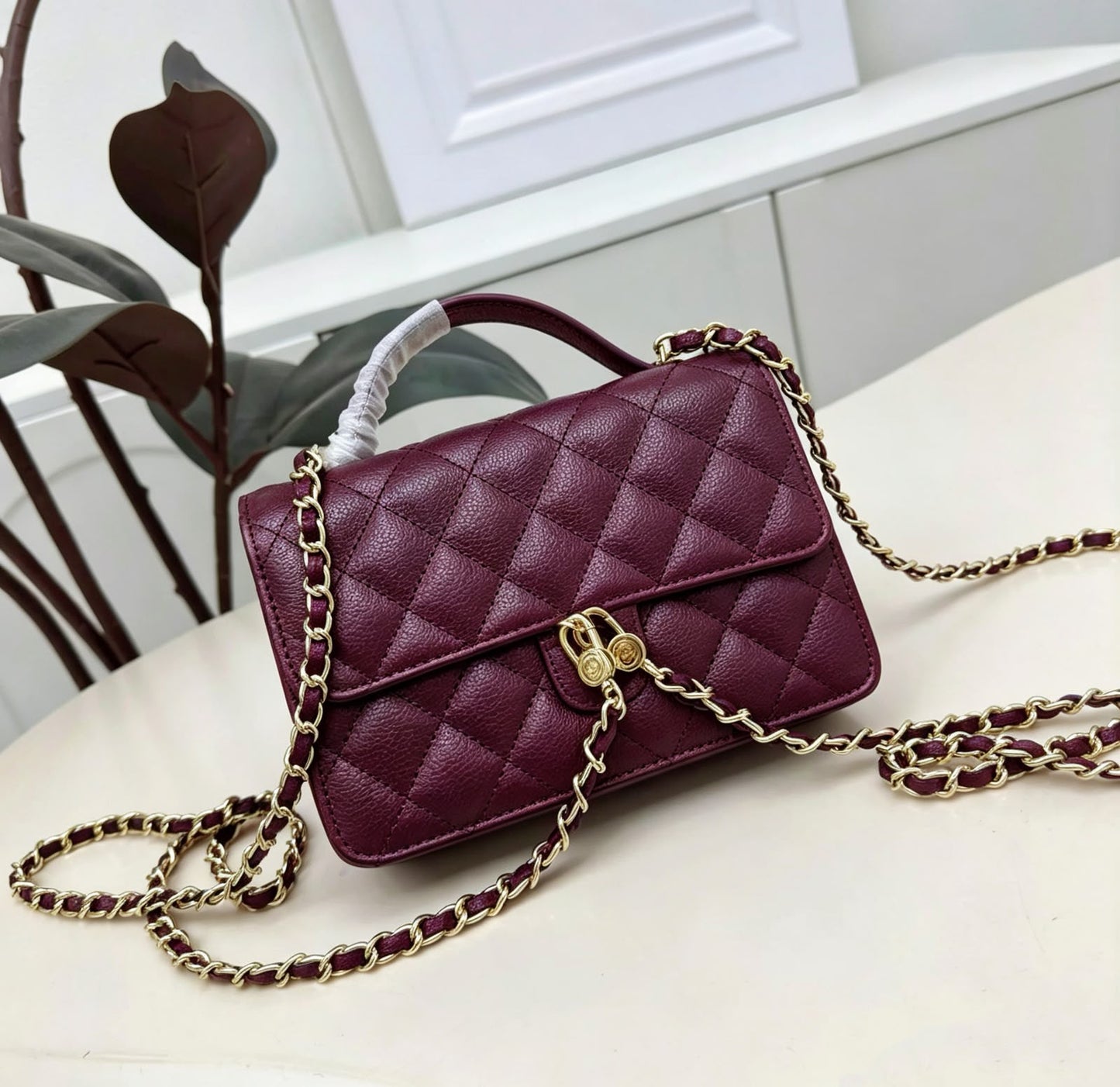 Channel-Burgundy Quilted Top Handle Bag with Gold Chain Strap