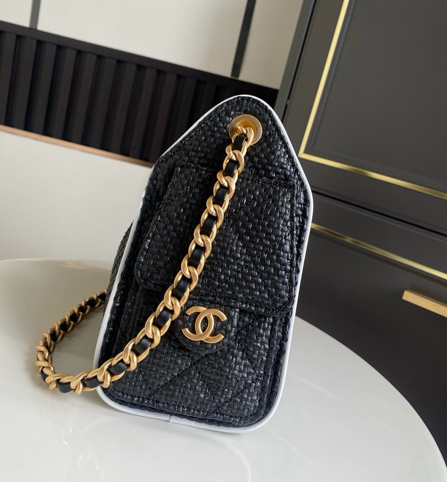 Channel Black Woven Quilted Bucket Bag.