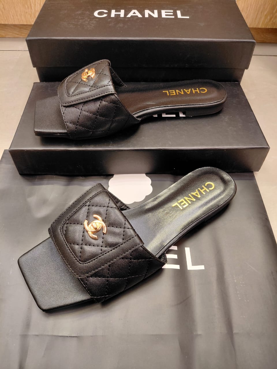 Channel Black Quilted Leather Flat Slide Sandals