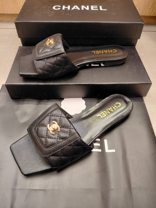Channel Black Quilted Leather Flat Slide Sandals
