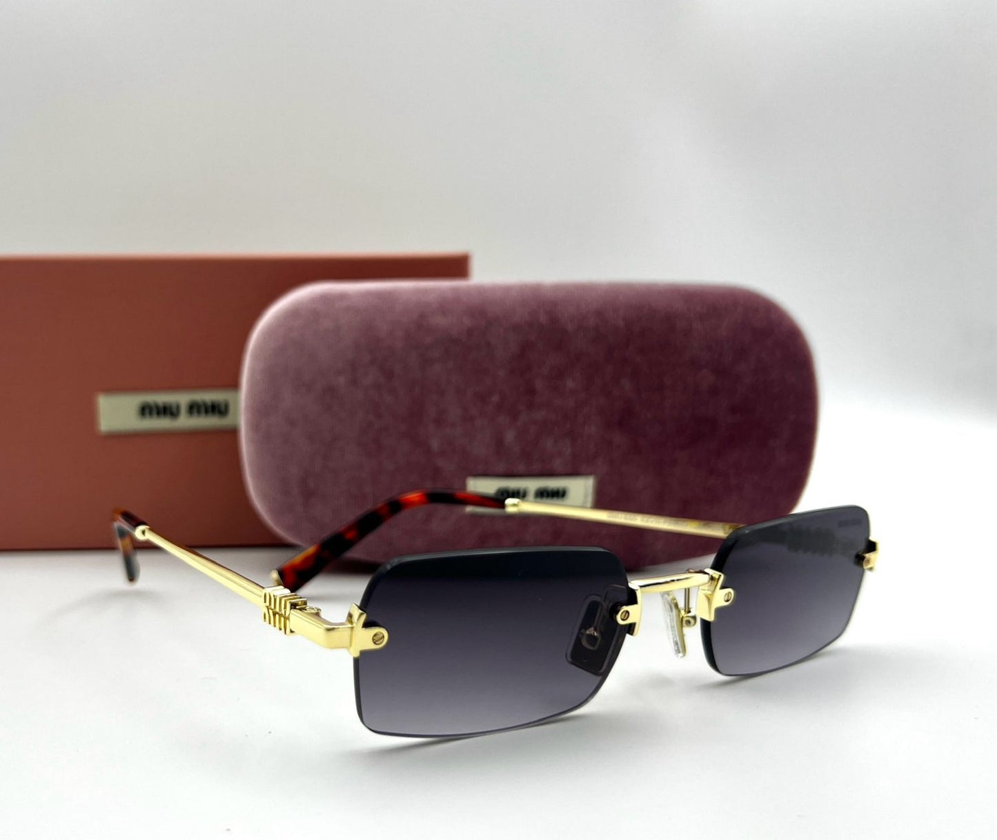 Miu Miu Rimless Rectangular Sunglasses – Gold Tortoise Tip Grey Gradient Lenses
