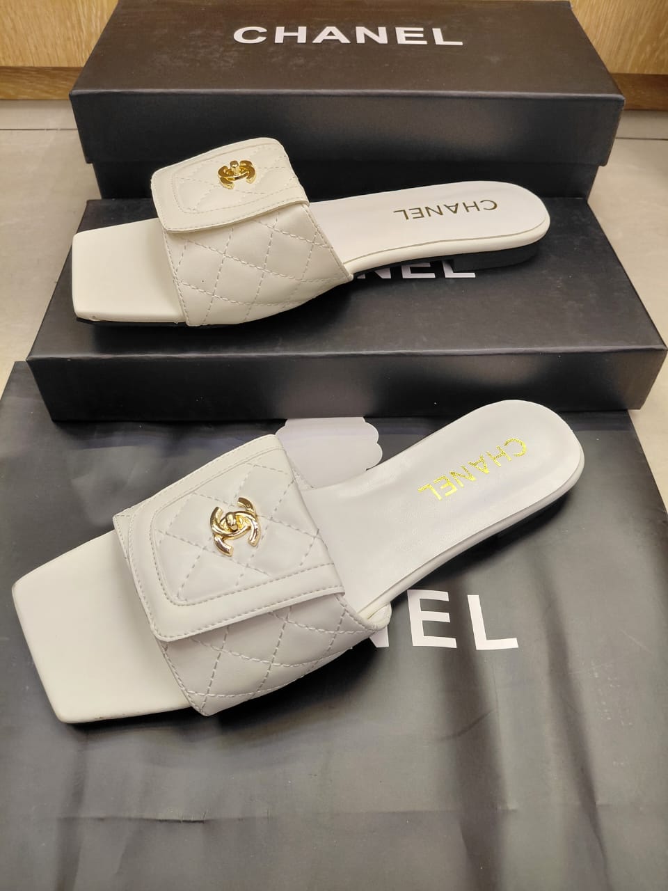 Channel White Quilted Leather Flat Slide Sandals