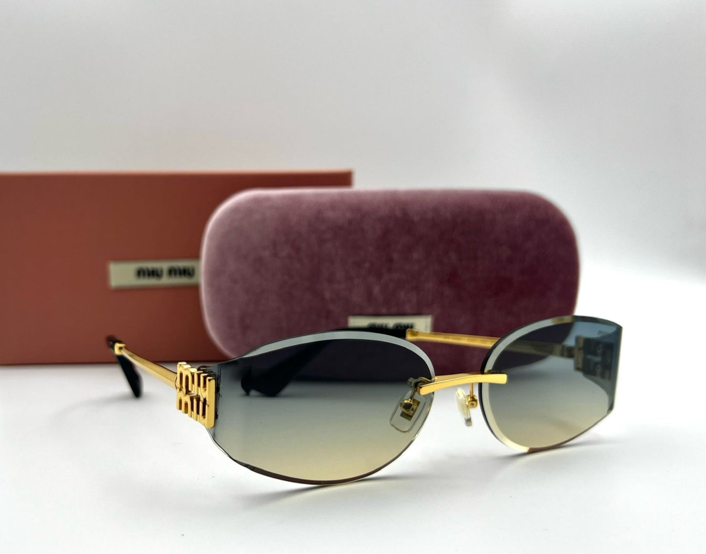 Miu Miu Rimless Geometric Sunglasses