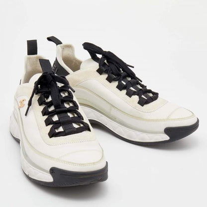 CHANEL Quilted Sole Mesh & Calfskin Sneakers–White/Black